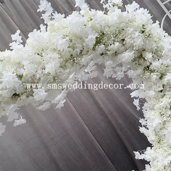 wedding arch with white flowers
